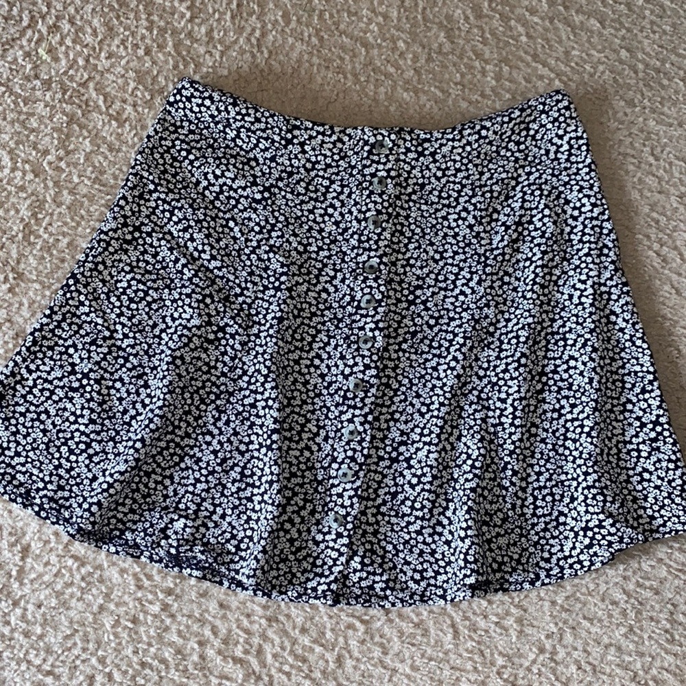 Black and white, floral flowy mini skirt.